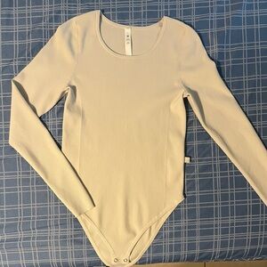 Lululemon pre loved ribbed stretch bodysuit cream color size L